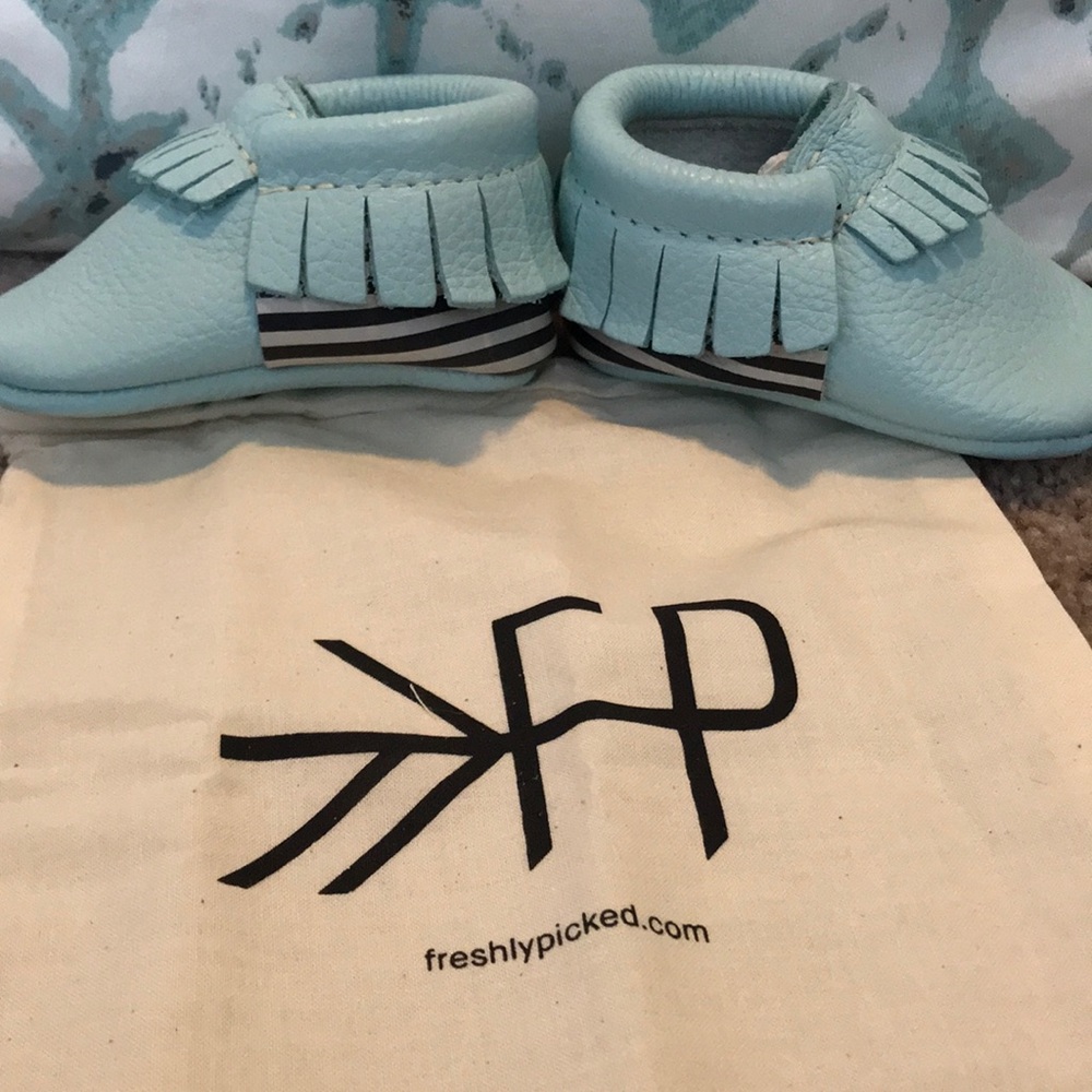 Brand new size 2 moccasins